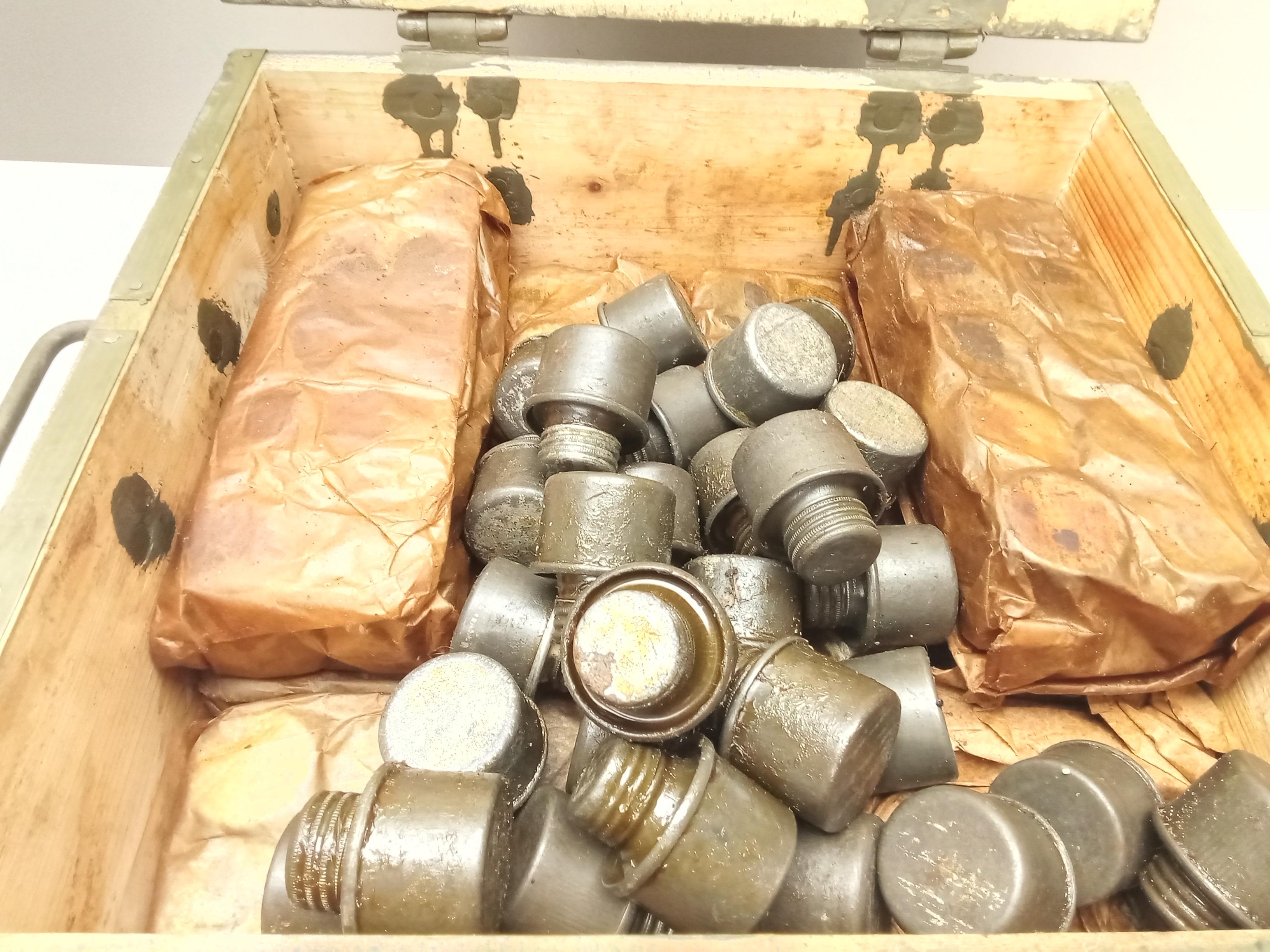 CRATE OF RUSSIAN MADE RIFLE OIL BOTTLES