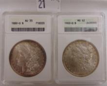 1880-O, 1902-O Morgan Dollars, AU55, MS62.