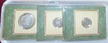 Variety: 1825 Half Dollar, 1852 Trime, 1831 Dime.