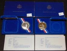 (2) 1986 Liberty Silver Dollars in cases, .900 fine Silver.