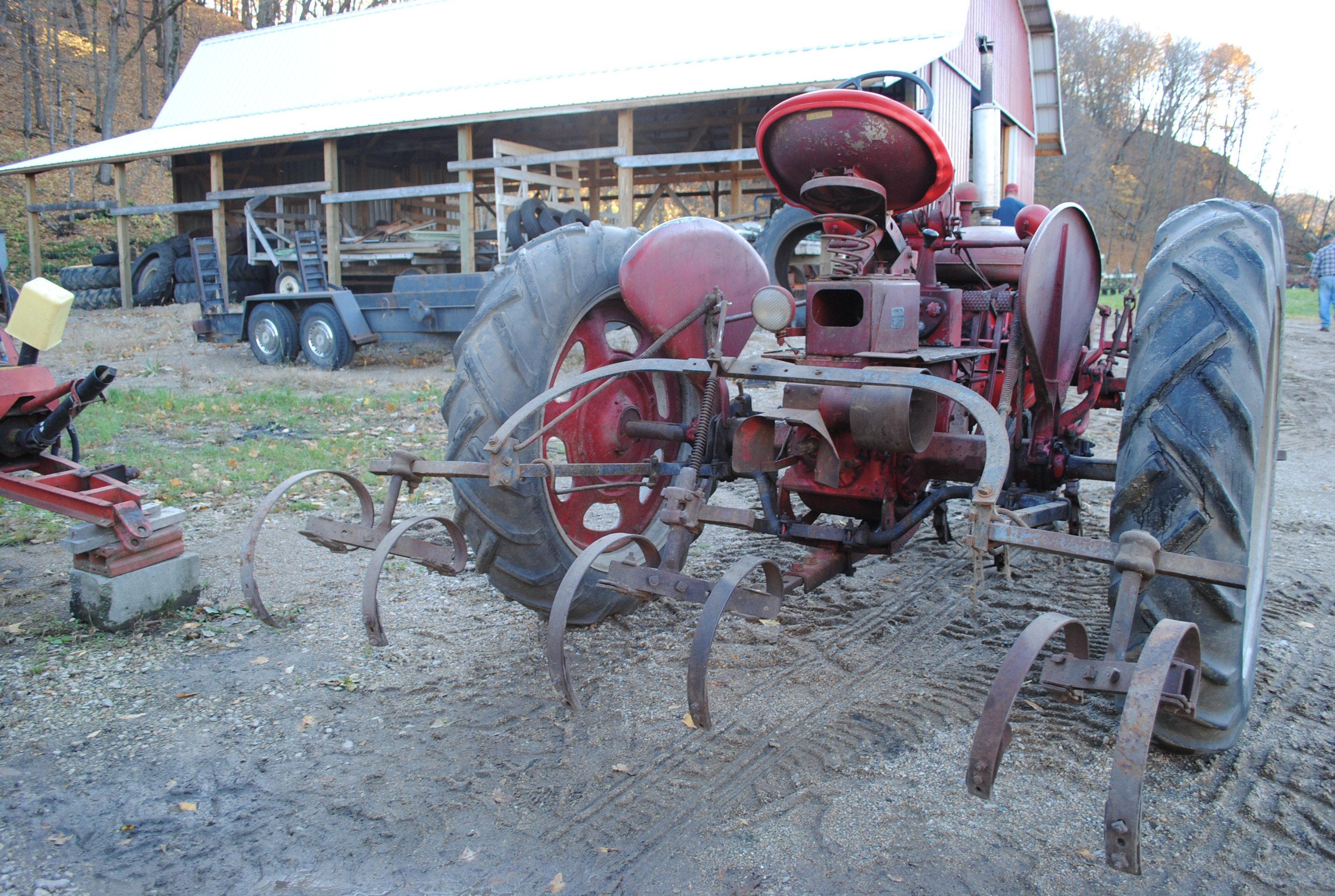 Farmall "C" with 2-row cultivator (only used as cultivator tractor since new), runs nice, the most o