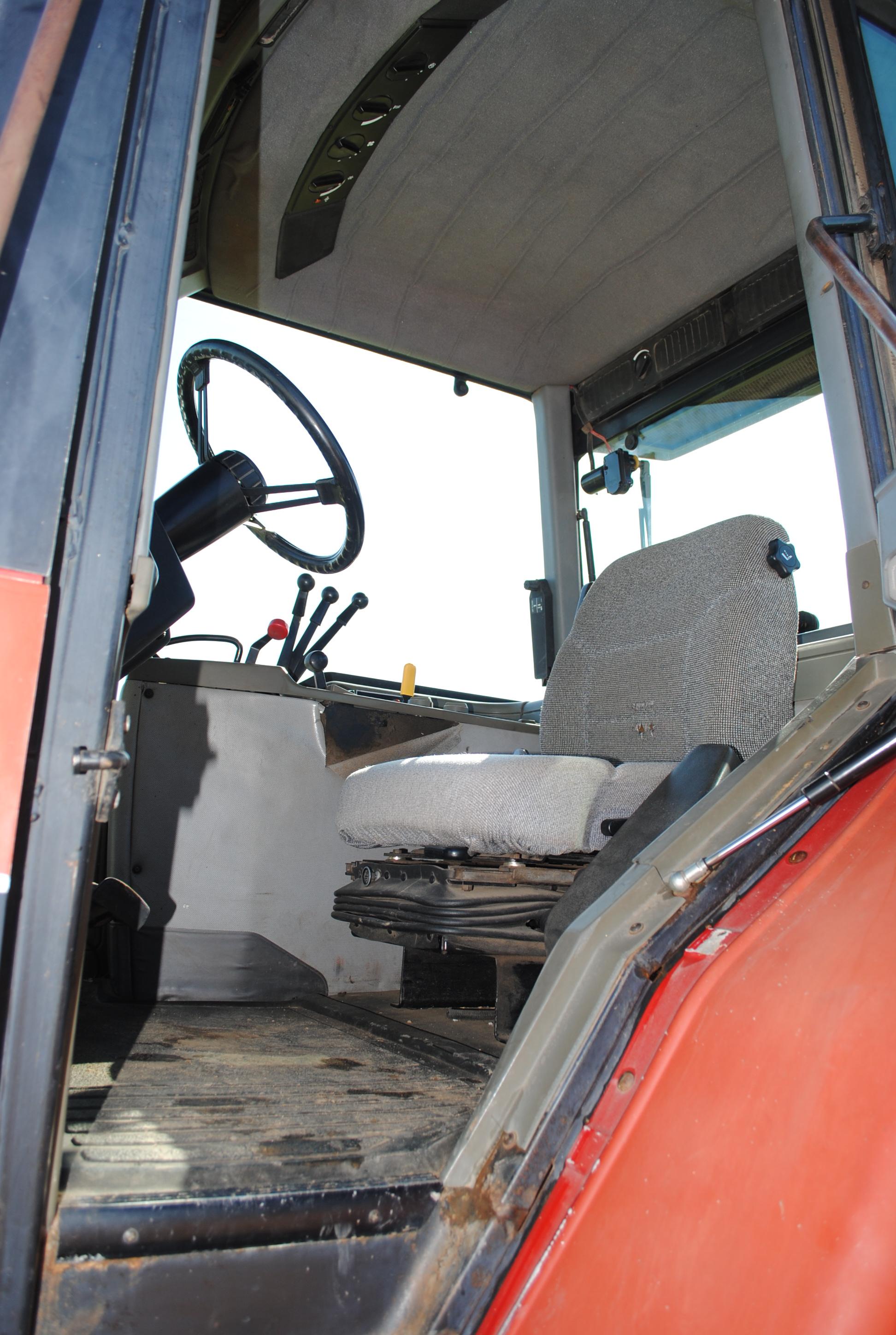 Case IH 7120 Tractor, Cab with heat and air conditioning, 3 hydraulics, dual pto, 3-point, 18.4R-42