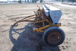 10' Minneapolis Moline grain drill with grass seeder on rubber, has a gear missing