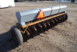 10' Minneapolis Moline grain drill with grass seeder on rubber, has a gear missing