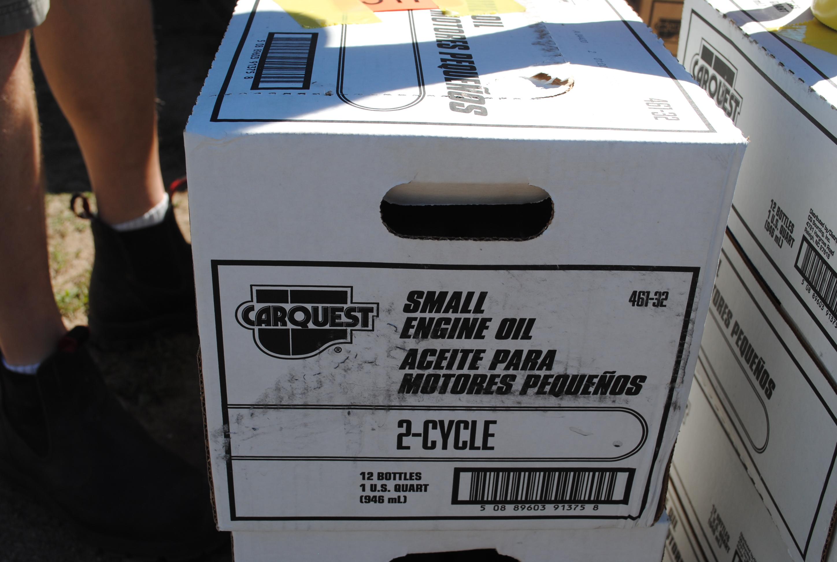 2 Boxes of (12) 1-quart 2-cycle motor oil (sells 2 times the money)