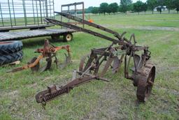 John Deere 2-14 pull-type plow on steel