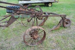 John Deere 2-14 pull-type plow on steel