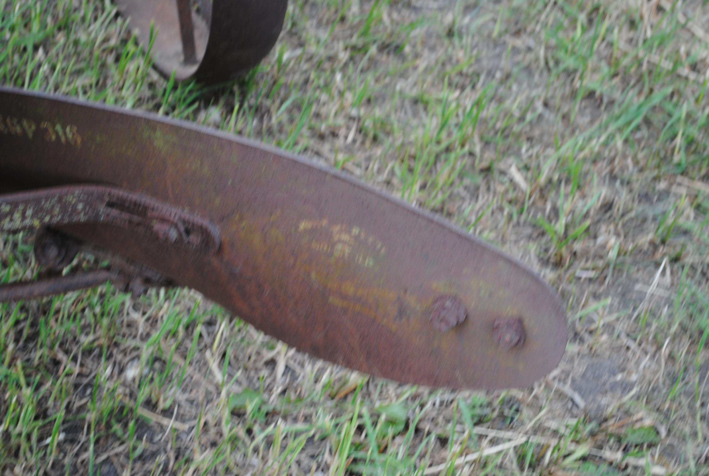 John Deere 2-14 pull-type plow on steel