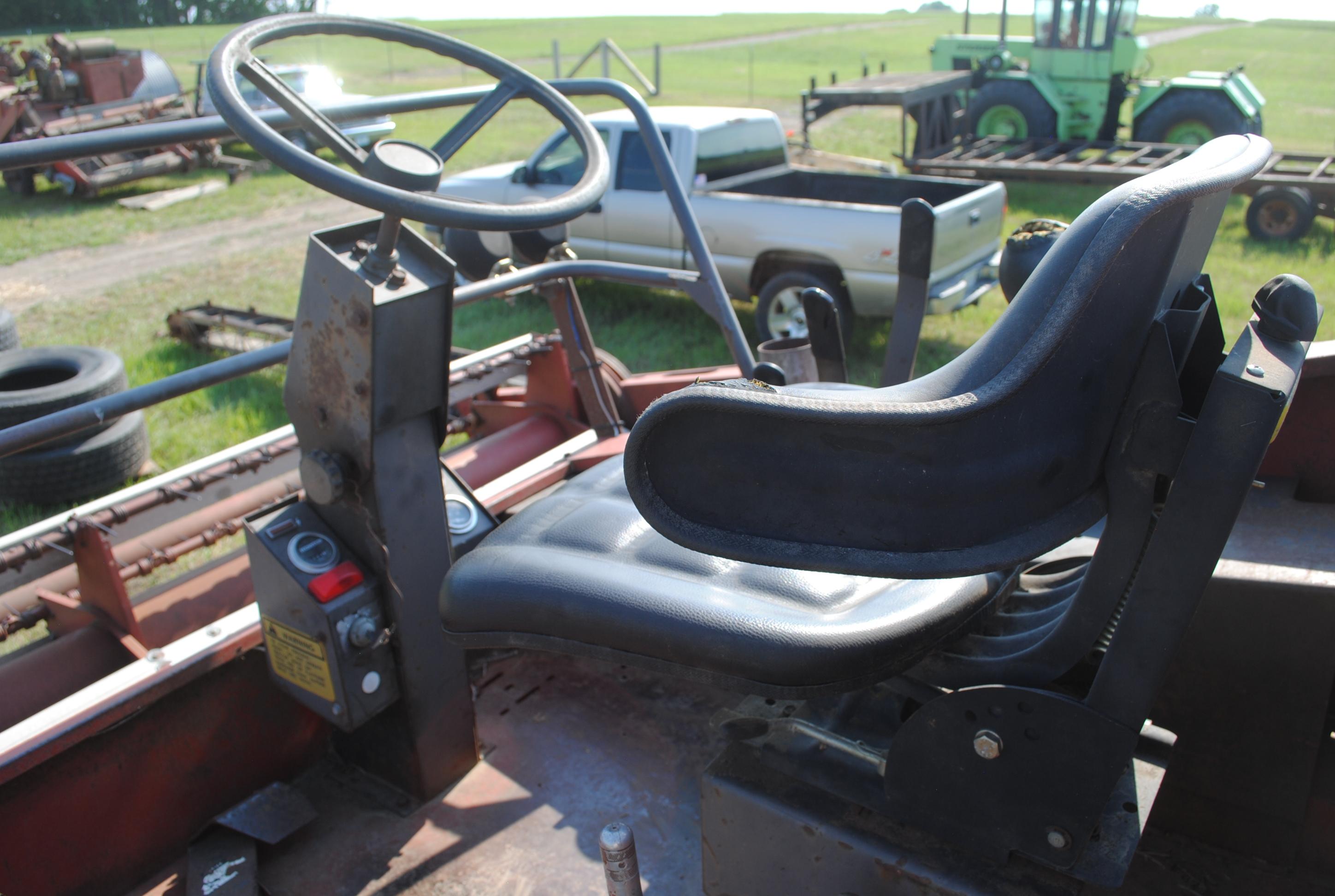 Hesston 6450 12' Swather, Chrysler gas engine, crimper, shows 5,504 hours, sells with home built swa