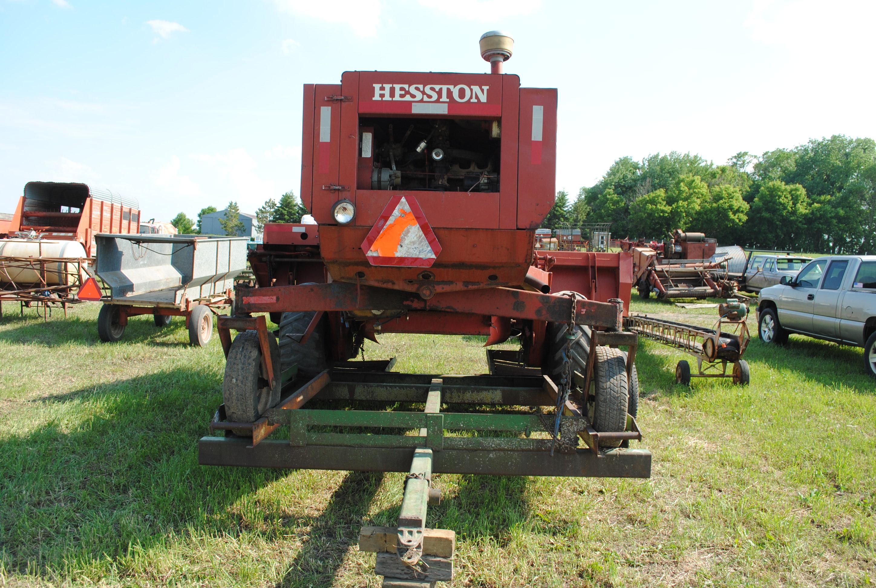 Hesston 6450 12' Swather, Chrysler gas engine, crimper, shows 5,504 hours, sells with home built swa