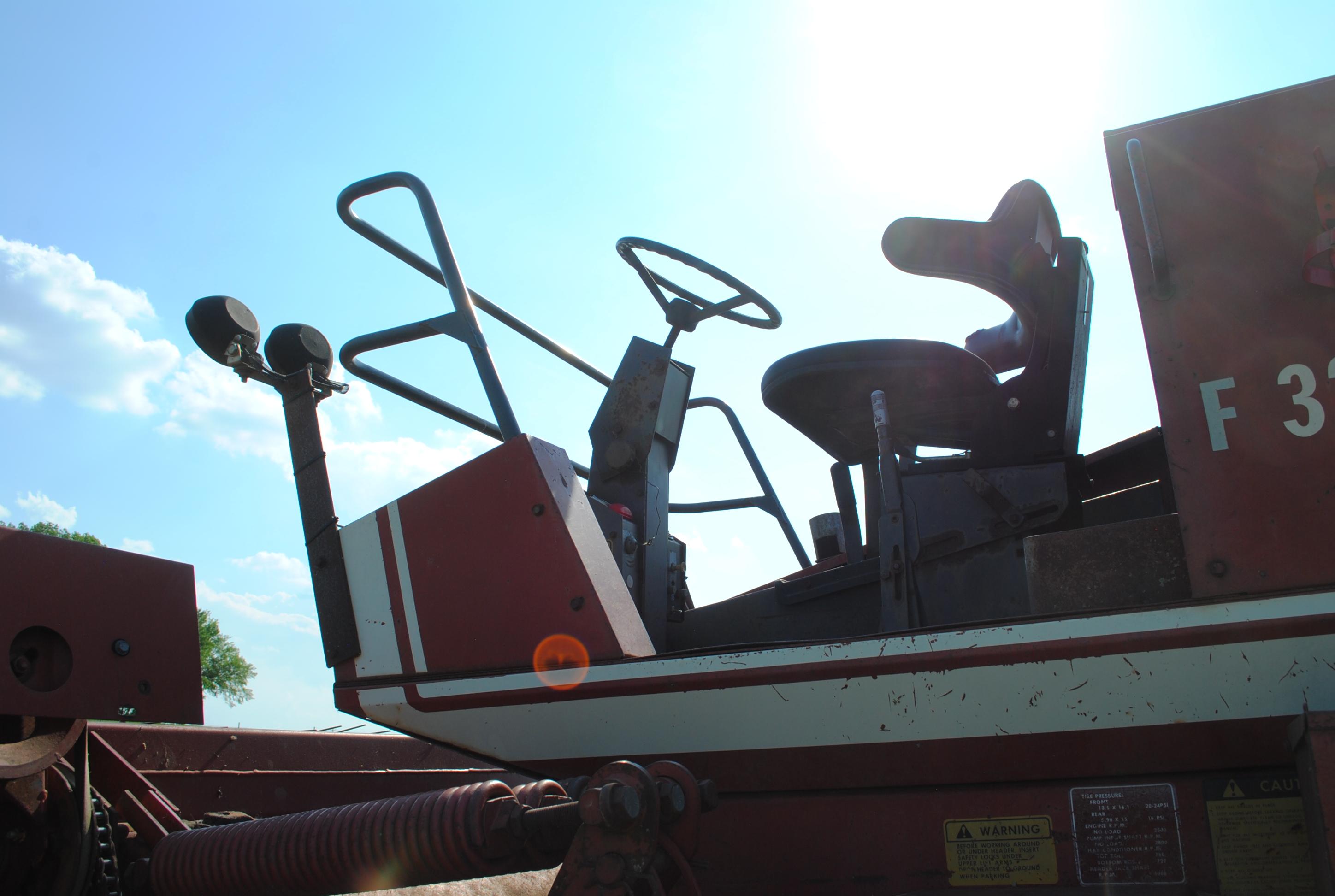 Hesston 6450 12' Swather, Chrysler gas engine, crimper, shows 5,504 hours, sells with home built swa