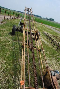 Approx. 25' bale conveyor on transport with electric motor