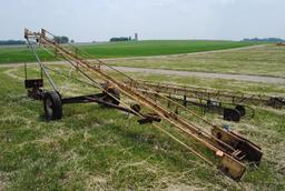 Approx. 25' bale conveyor on transport with electric motor