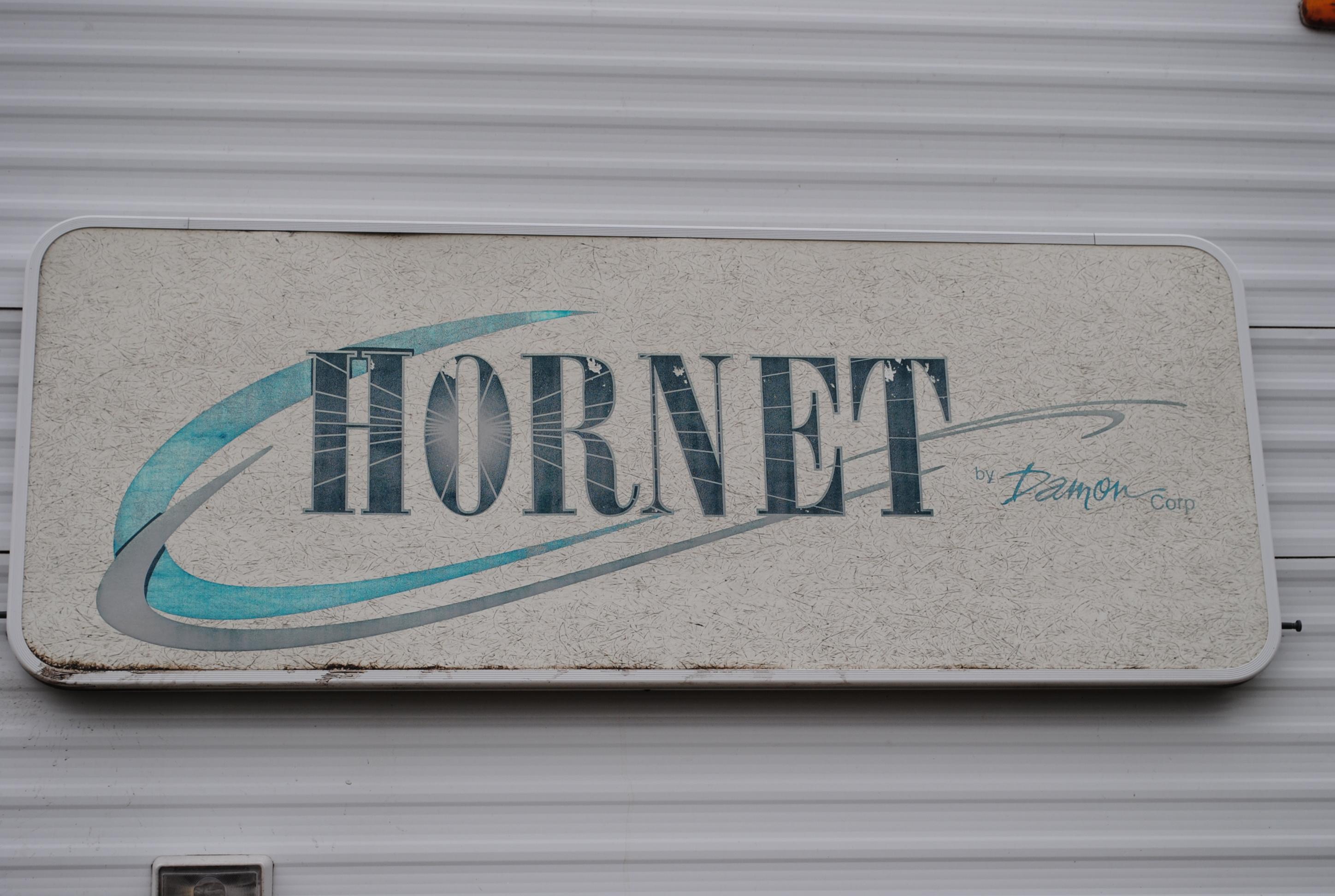 **T** 1999 Hornet Bumper pull Camper 29'x8', Queen bed in master, couch folds down into bed, dinette