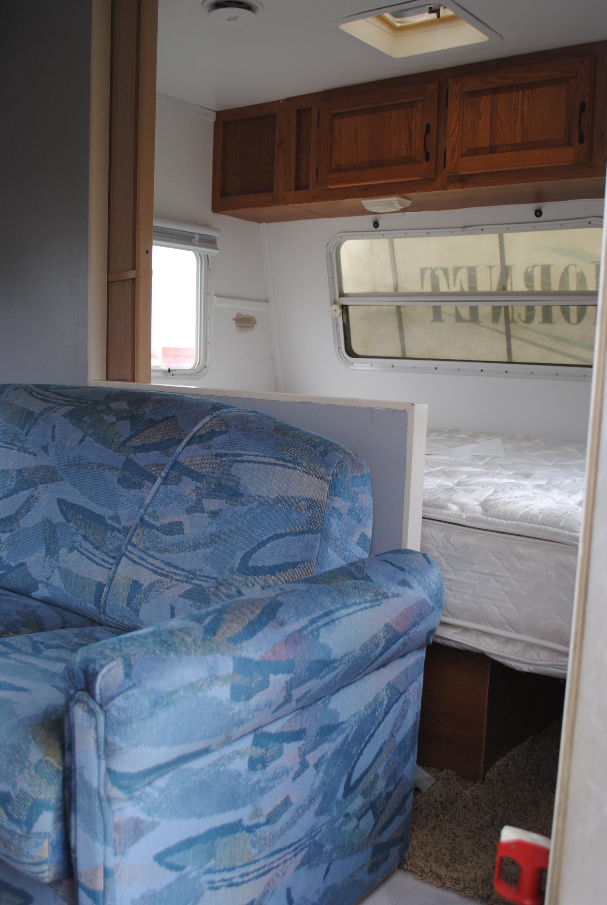 **T** 1999 Hornet Bumper pull Camper 29'x8', Queen bed in master, couch folds down into bed, dinette