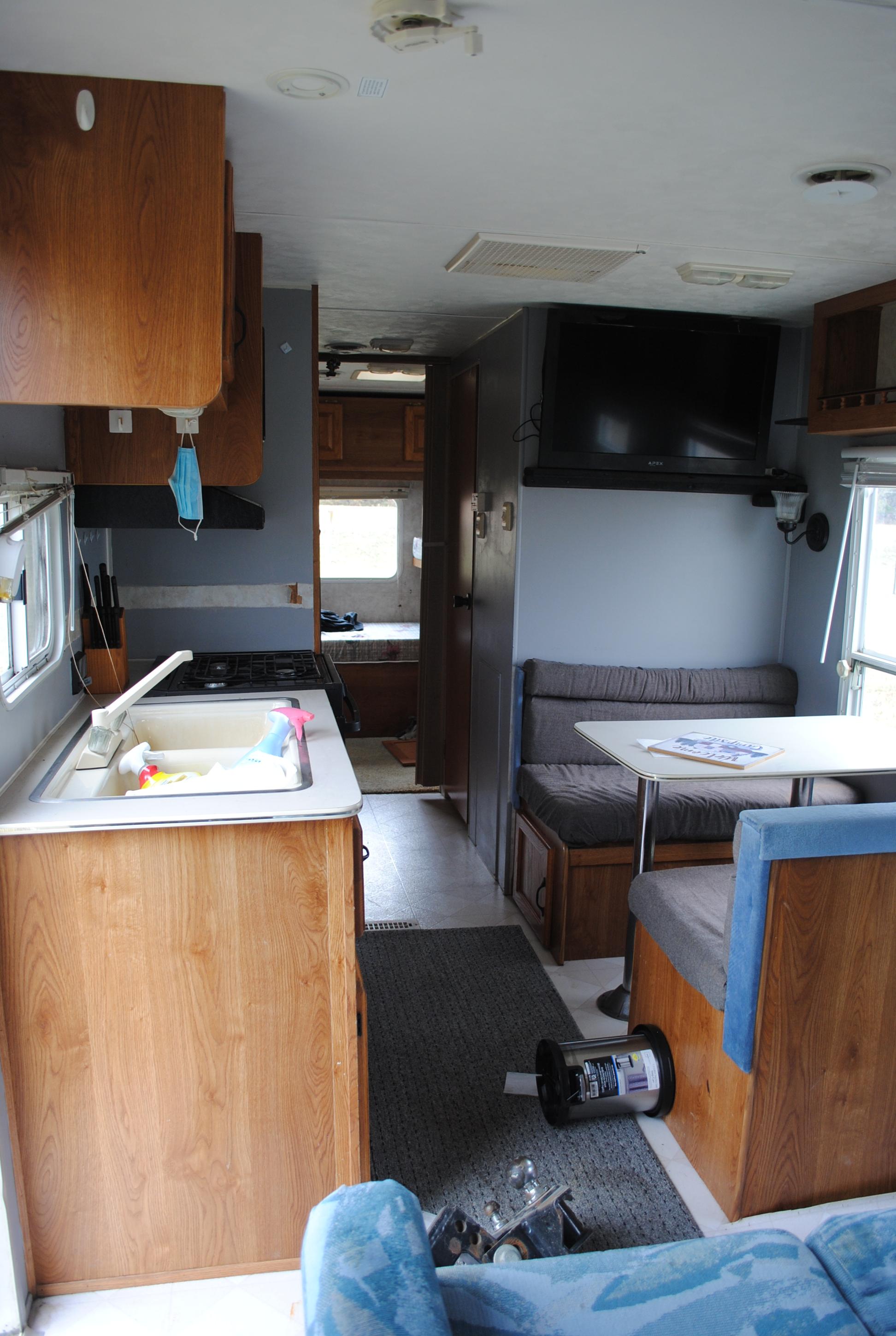 **T** 1999 Hornet Bumper pull Camper 29'x8', Queen bed in master, couch folds down into bed, dinette