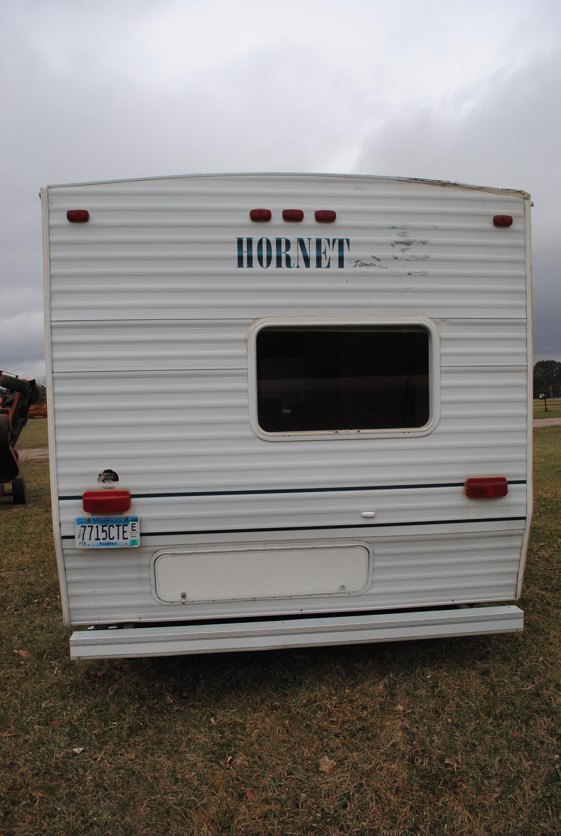 **T** 1999 Hornet Bumper pull Camper 29'x8', Queen bed in master, couch folds down into bed, dinette