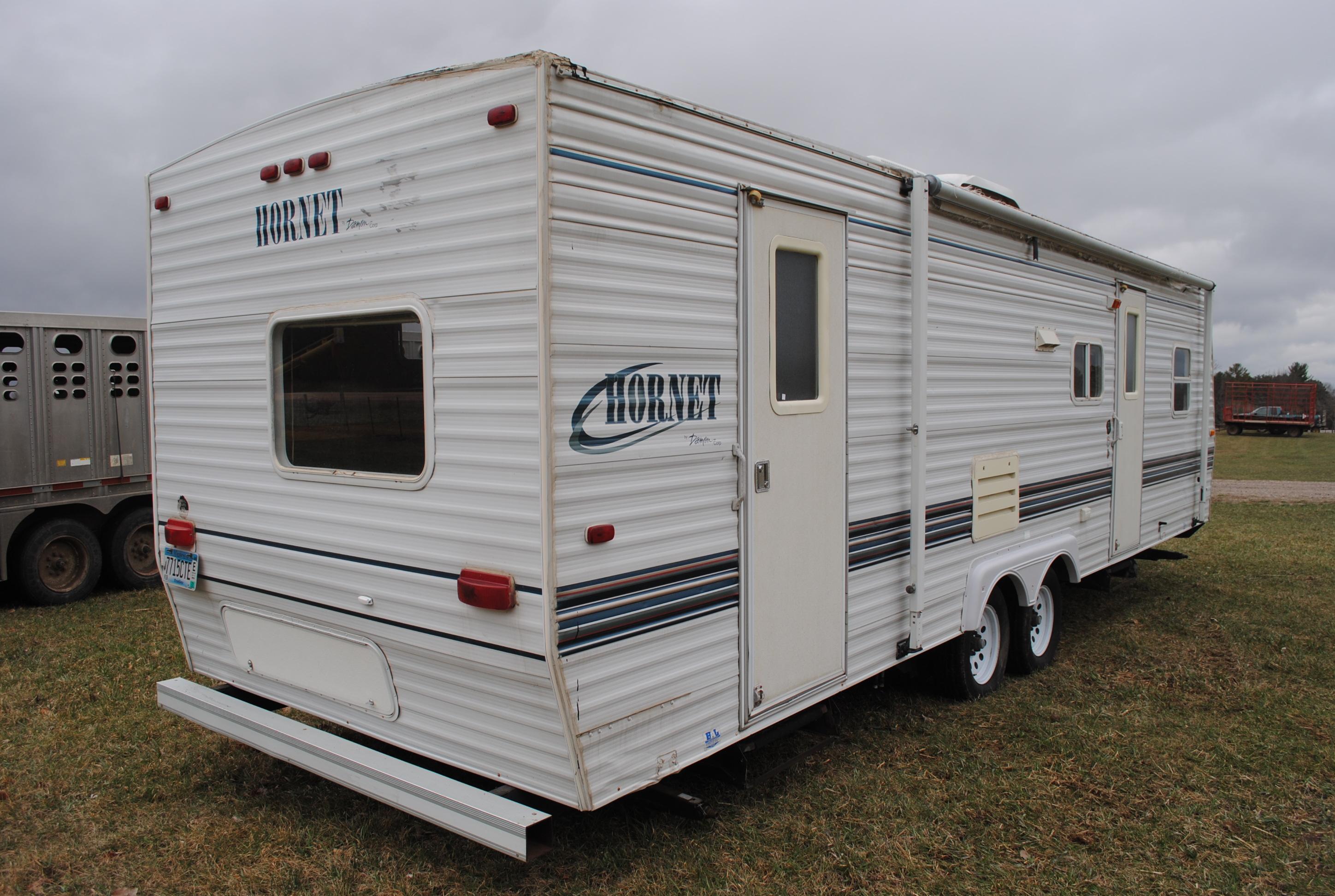 **T** 1999 Hornet Bumper pull Camper 29'x8', Queen bed in master, couch folds down into bed, dinette
