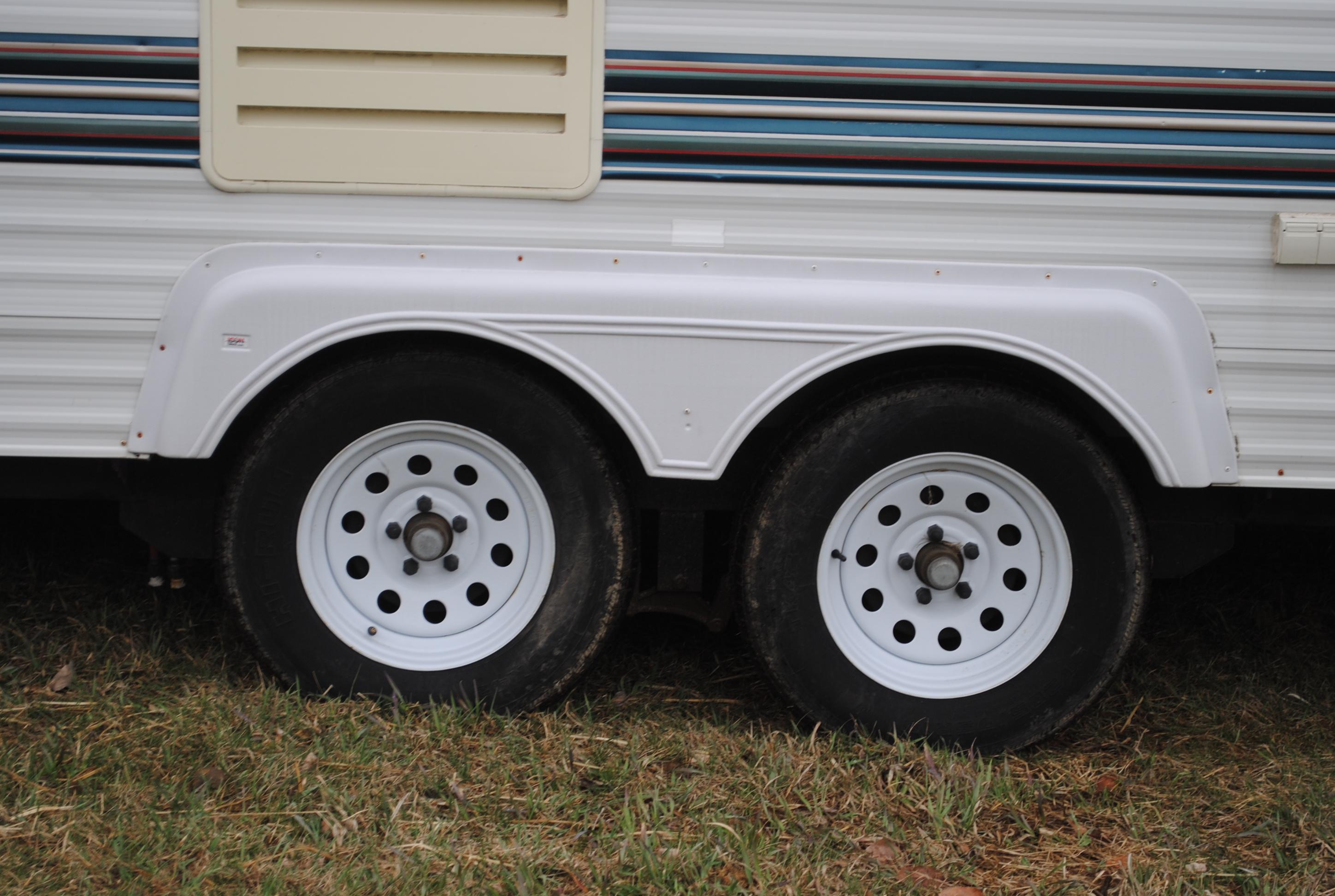 **T** 1999 Hornet Bumper pull Camper 29'x8', Queen bed in master, couch folds down into bed, dinette