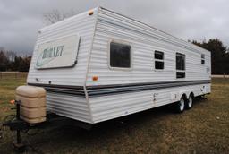 **T** 1999 Hornet Bumper pull Camper 29'x8', Queen bed in master, couch folds down into bed, dinette