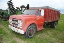 **T** 1971 Chevy C50 truck, V8, 350 engine, 13' Obeco wood dump box, hydraulic, 4+2 tranny, new brak