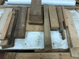 Small blocks of solid wood. No warranty on type of wood or amount