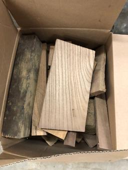 Small blocks of solid wood. No warranty on type of wood or amount