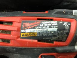 Milwaukee compact cordless driver with charger and nut driver accessories