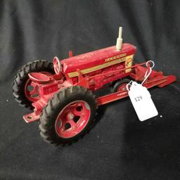 1/16 scale Farmall 560 Tractor and McCormick Trip-Bucket Loader