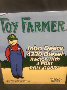 1/16 scale Ertl 1998 National Farm Toy Show Collectors Edition JD 4230 Diesel Tractor w/4 Post Roll