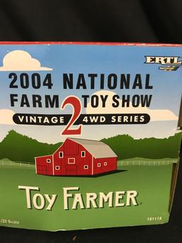1/32 scale Ertl 2004 National Farm Toy Show MF 1500 4WD Tractor, NIB