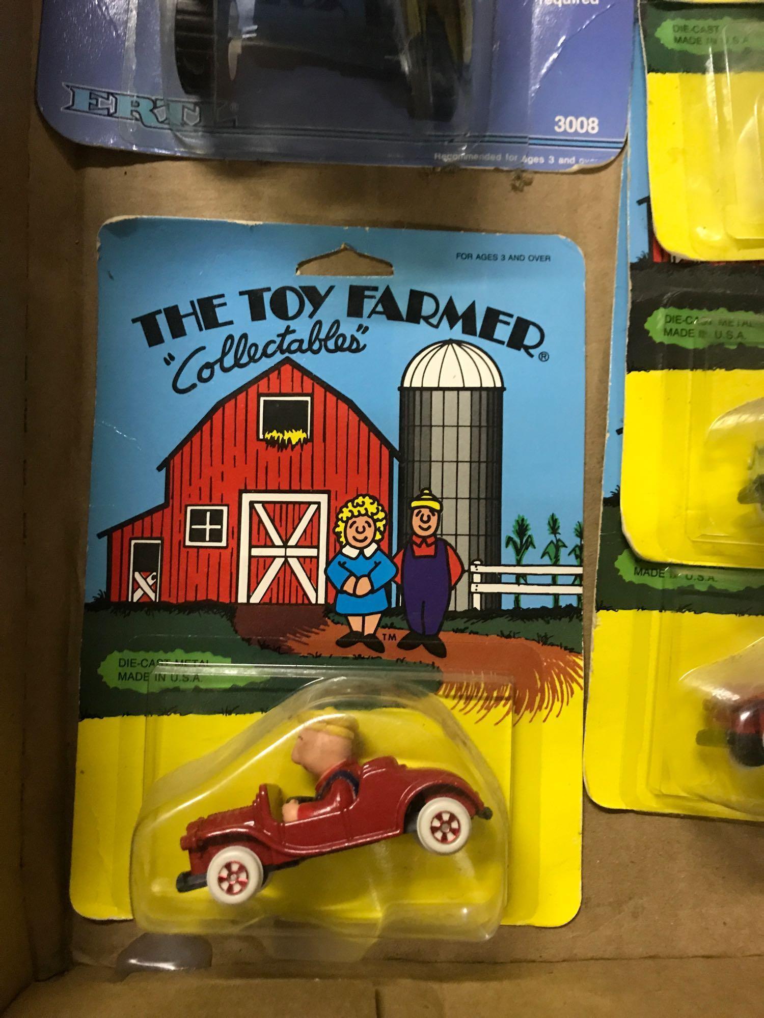 Assortment of Matchbox and Toy Farmer Collectibles