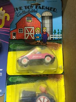Assortment of Matchbox and Toy Farmer Collectibles
