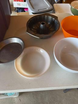 Rival crock pot, EZ Pockets 4 pc set, mixing bowls, muffins tin, baking pan, bundt pan.