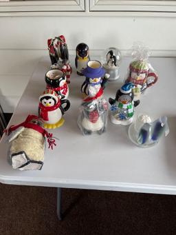 Assortment of penguin figurines.... Shipping