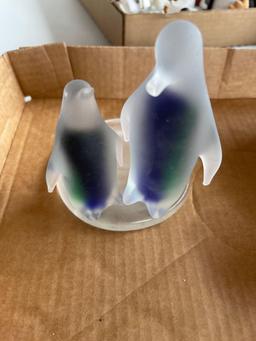 Assortment of penguin figurines.... Shipping