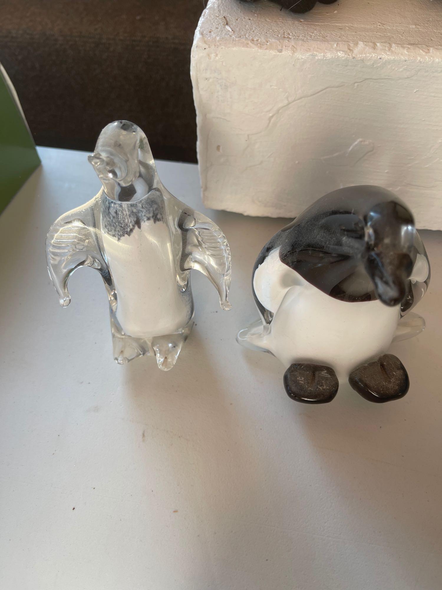 Pair of colored glass penguins