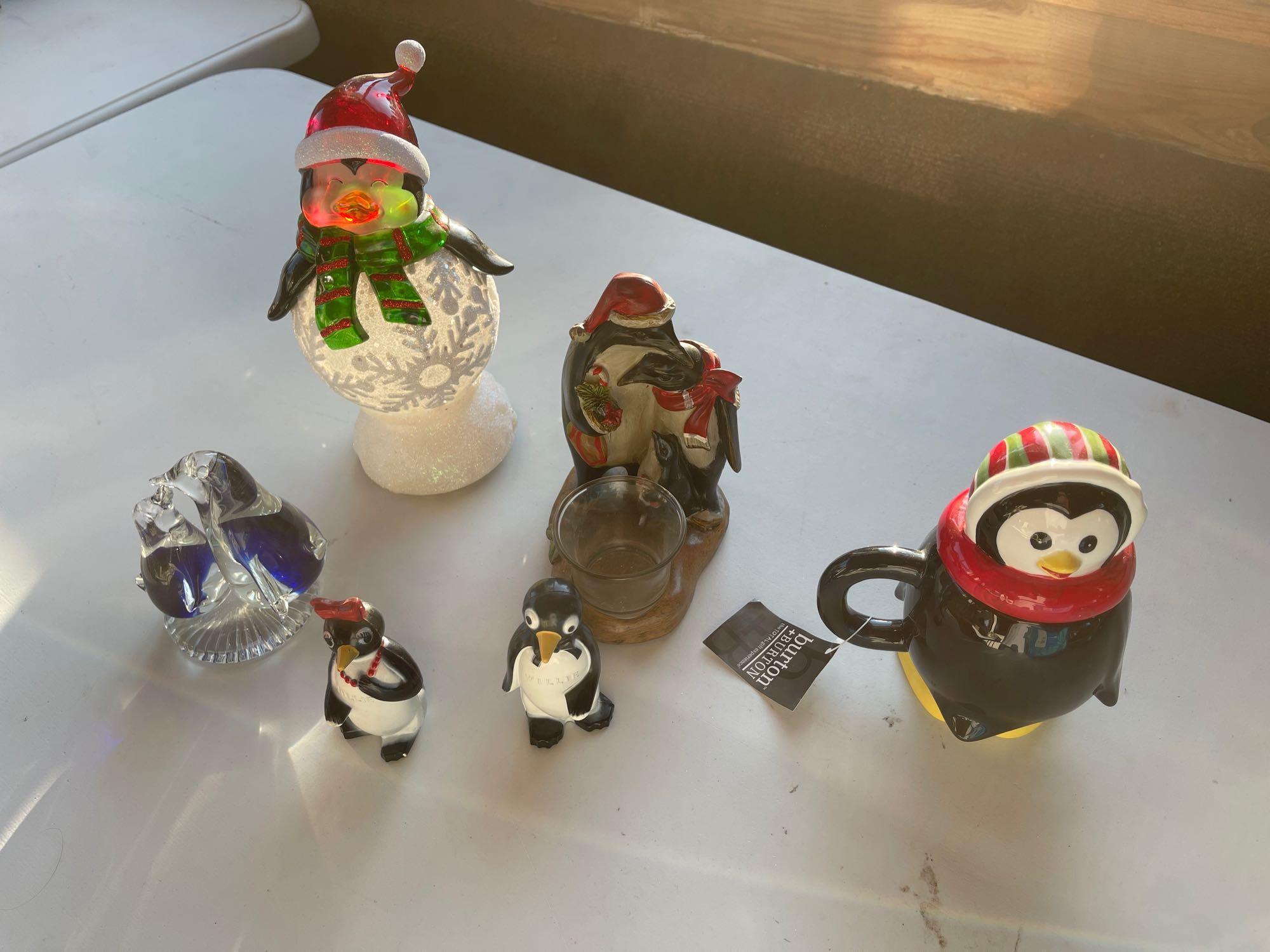 Pair of colored glass penguins