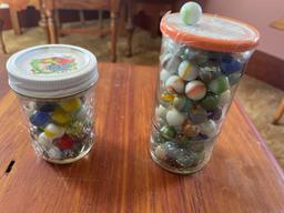 2 jars of marbles.... Shipping