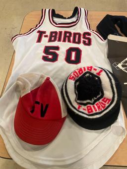 Various sized T-Birds and Floyd Valley shirts and cheerleading memorabilia