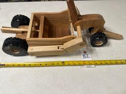 Handcrafted wood dirt scraper