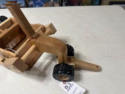 Handcrafted wood dirt scraper