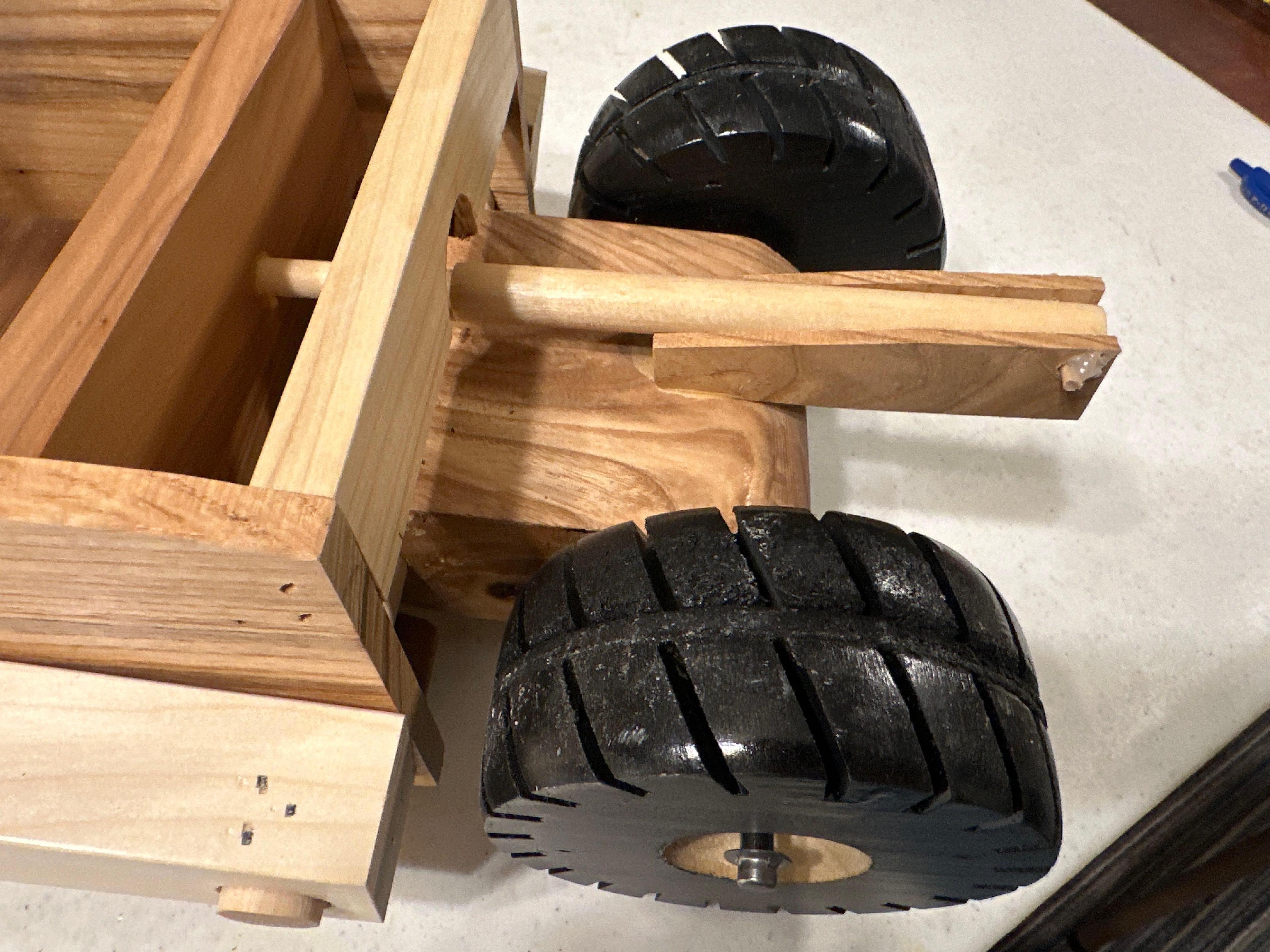 Handcrafted wood dirt scraper