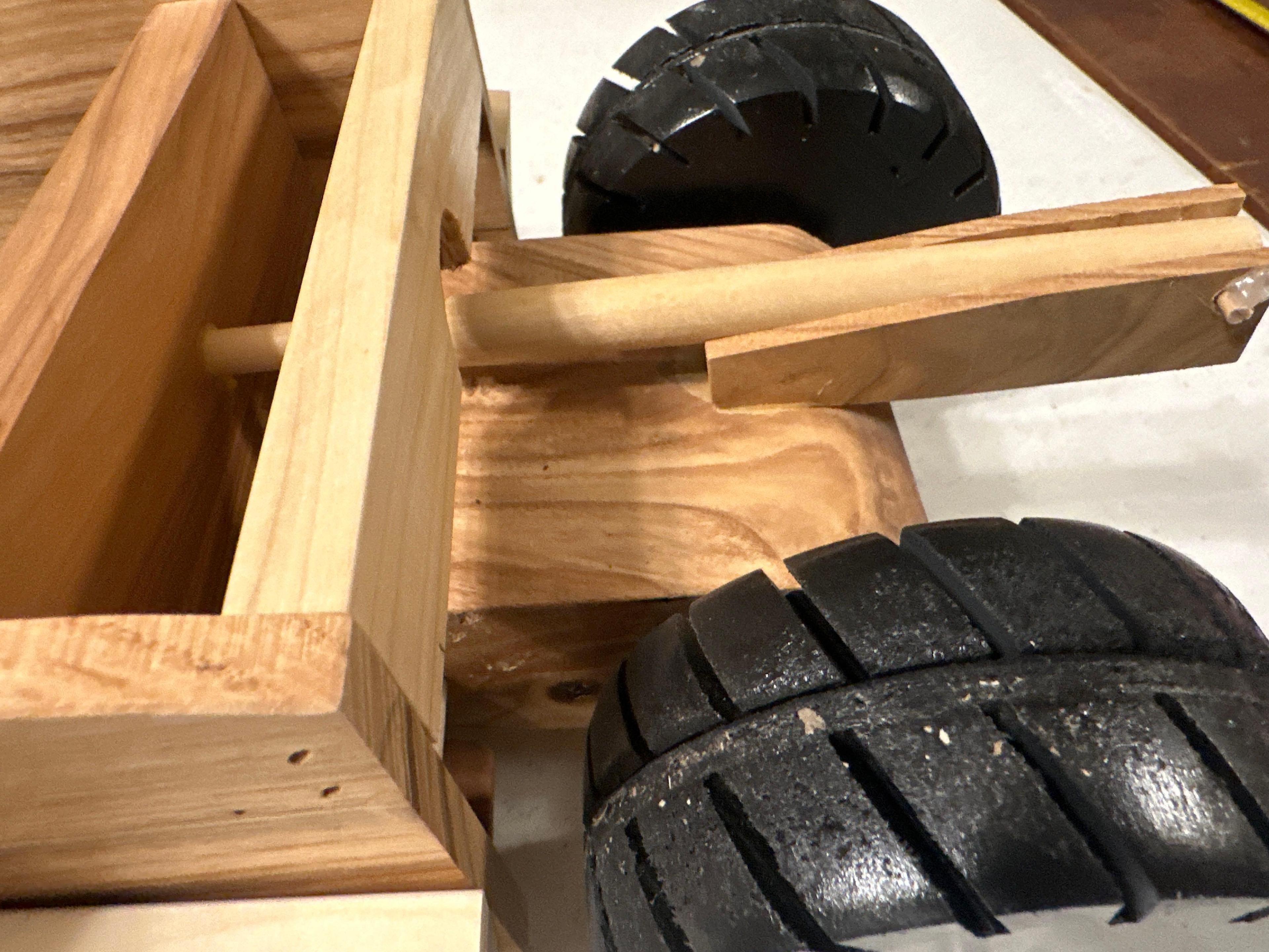 Handcrafted wood dirt scraper