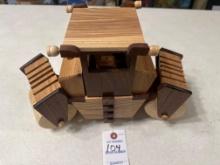 Handcrafted wood asphalt roller