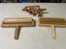 Handcrafted wood land rollers and plow
