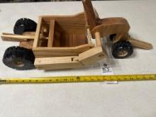 Handcrafted wood dirt scraper
