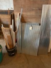 Assorted lumber in bucket, decorative tin, assorted plywood