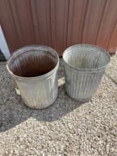 2 steel trash cans