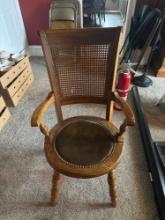 Oak round seated vintage chair with leather inlaid seat with cane back (Really nice)